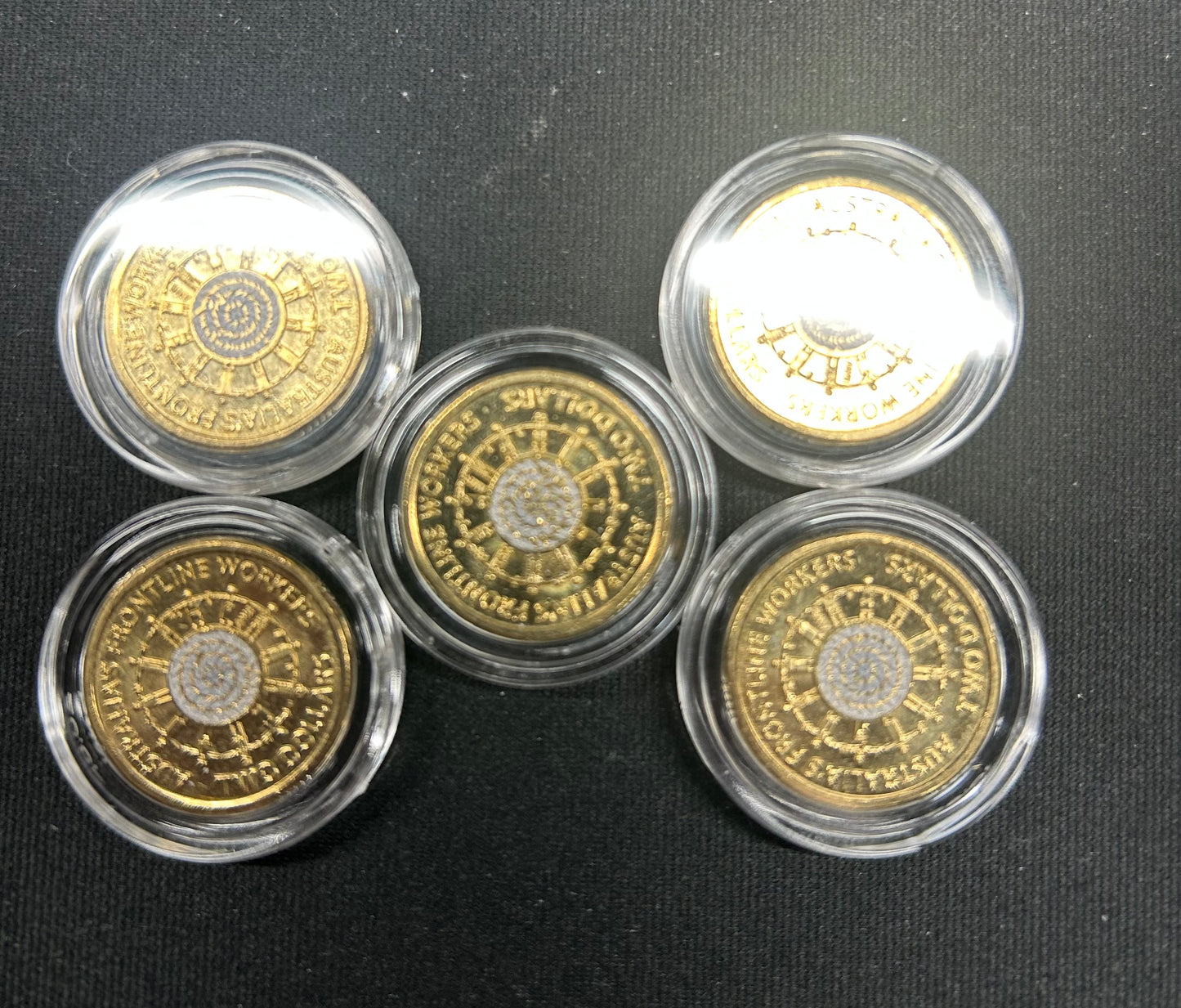 UNC $2 coins in lighthouse capsule